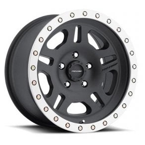 Lettmetallfelger 4x4, matt sort felg med sølvkant, fem doble eiker og små bolter rundt ytterkanten.