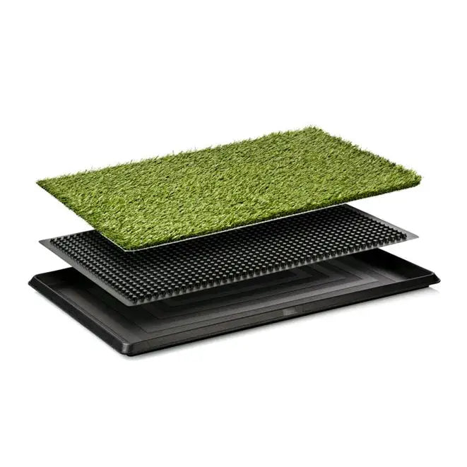 Hundepleie, grønt kunstgresslag med sort plastnett under og svart oppsamlingsbakke i rektangulær form.