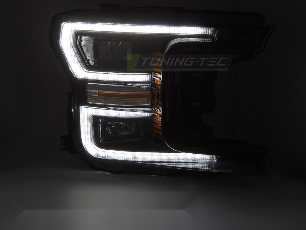 Detaljbilde av frontlykter Ford F150 MK13 17-20 med LED-detaljer.