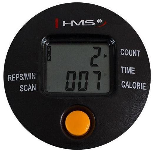 Stepper med digital treningscomputer i sort plast, stor skjerm og gul knapp, viser treningsdata rett forfra.