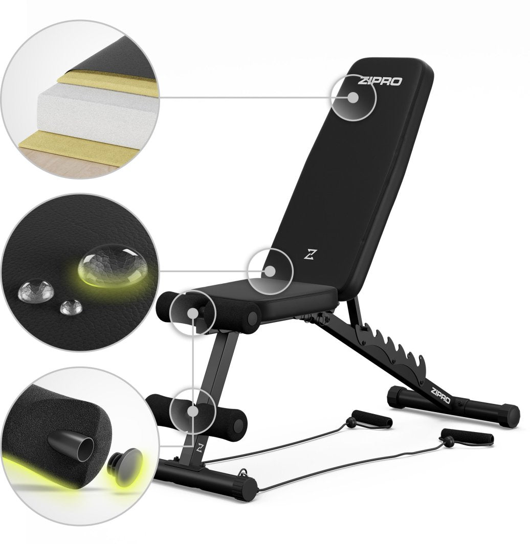 Treningsbenk Justerbar sammenleggbar med ekspandere, svart og rød, plassert på hvit bakgrunn.