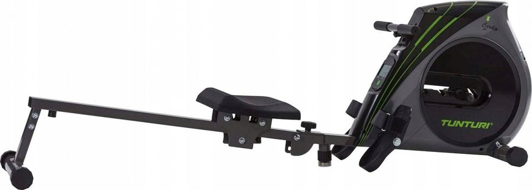 Romaskin i svart og grønt sett fra siden, med sete, fotstøtter og håndtak tydelig synlige på bildet.