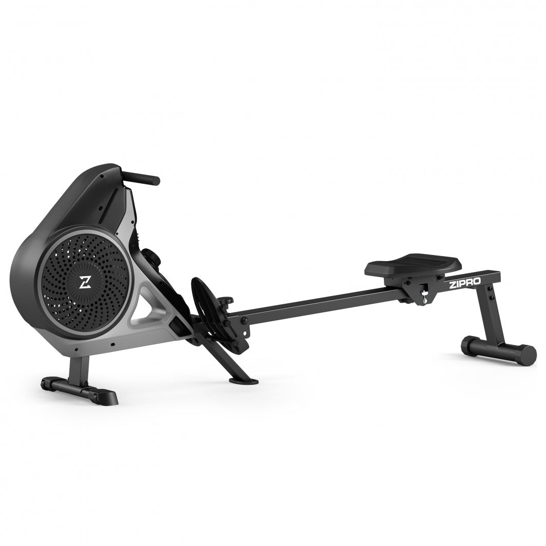 Romaskin Sammenleggbar i sort og grått, sett fra siden med sete, fotstøtte, håndtak og ventilasjonshull foran.