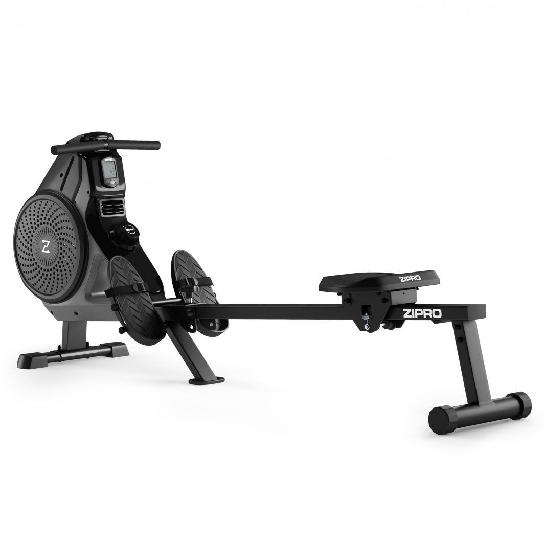 Sammenleggbar Romaskin i sort med justerbare fotplater, LCD-display og glidebenk, sett fra skrå vinkel.