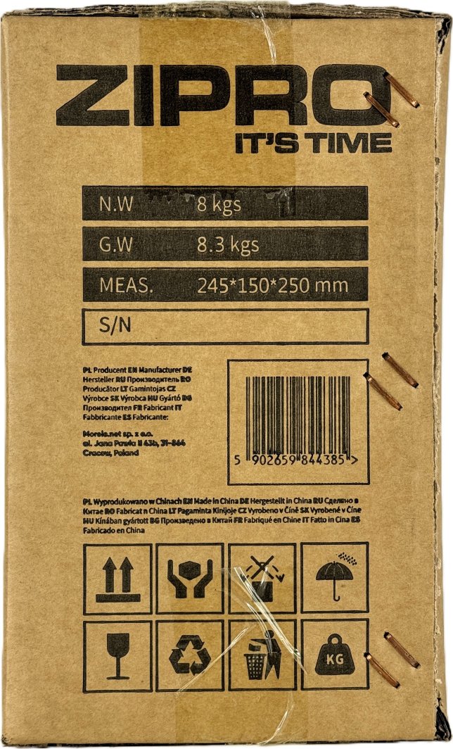 Vektplater pakket i brun pappeske med svart tekst, strekkode, mål og fraktsymboler synlige på forsiden.