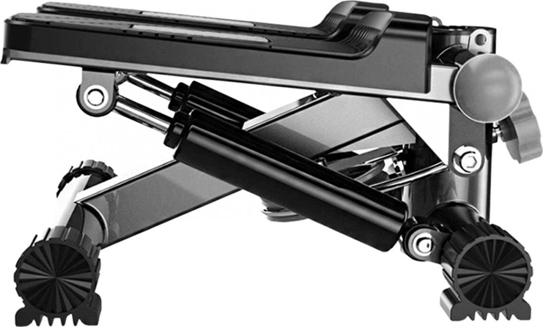 Stepper Trening sammenleggbar sort og sølv stepmaskin med hydrauliske sylindre og rillede fotputer, sett fra siden.
