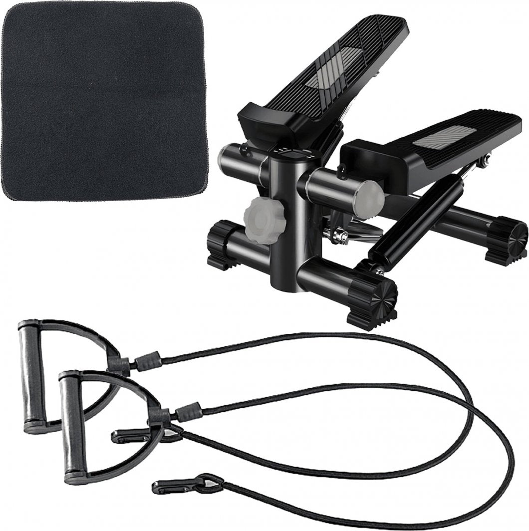 Mini Stepper med to sorte tråkkpedaler, svarte treningsstrikker med håndtak og svart matte, sett fra skrå vinkel.