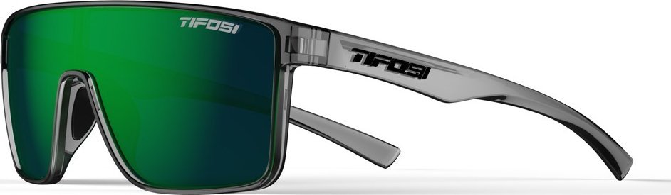 Sportsbriller Dame med stor grønn linse, gjennomsiktig grå ramme og sorte detaljer, sett fra siden med logo.