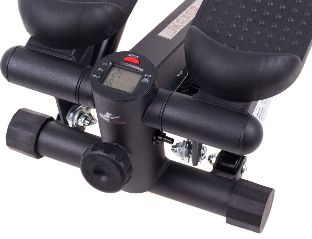 Mini Stepper i sort metall og plast med display, teksturert fotplate og justeringsskrue, sett nærme.