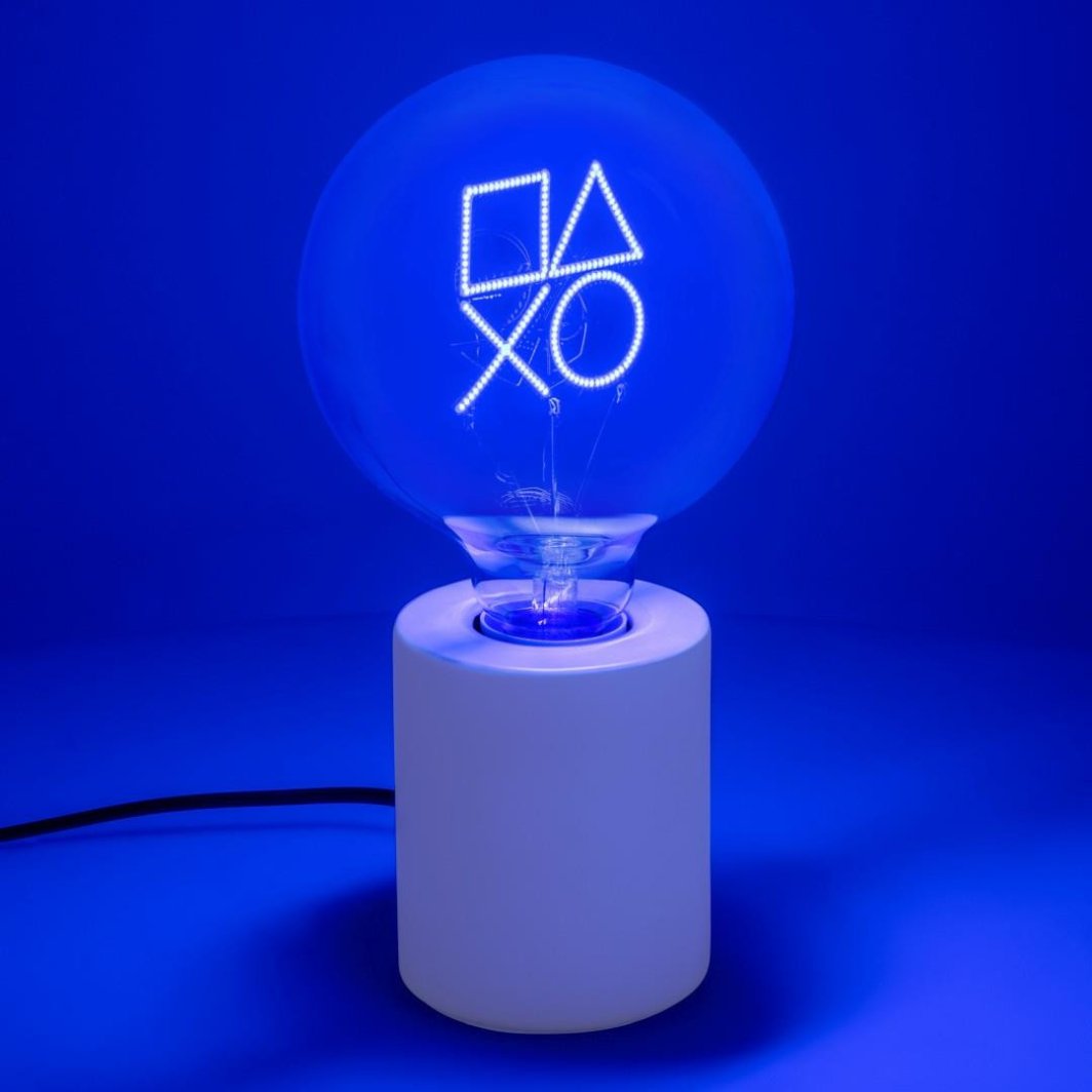 Sammenleggbar tredemølle lampe PlayStation LED-neon med blå lysende symboler på hvit sokkel.