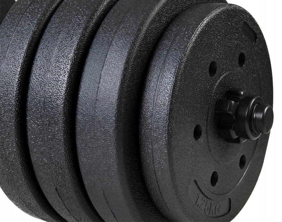 Justerbare Manualer med svarte vektskiver og riflet stang, sett fra siden med tydelig låsekrage.