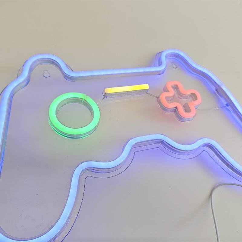 Walking Pad LED-lampe gamepad med blått, grønt, gult og rosa neonlys på akrylplate, skrå detalj.