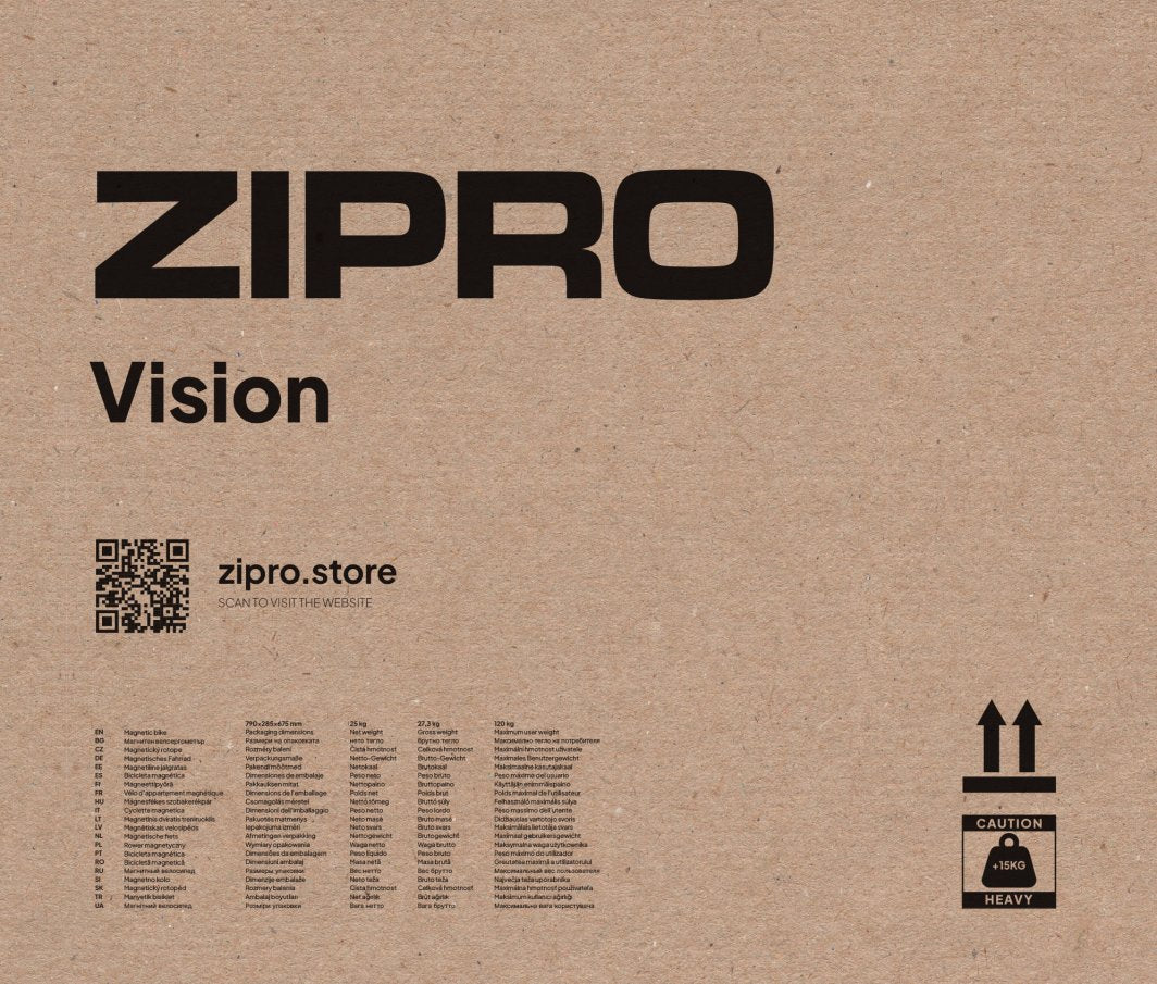 Ergometersykkel i brun pappeske med sort Zipro-logo, QR-kode, advarselsmerke og synlig spesifikasjonstekst.