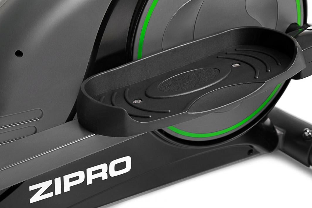 Crosstrainer med sort fotplate i plast og metall, grønne linjer og ZIPRO-logo på rammen, sett fra siden.