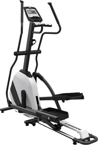 Ellipsemaskin i sort og hvit, sett fra siden med synlige pedaler, håndtak og skjerm med kontrollpanel.