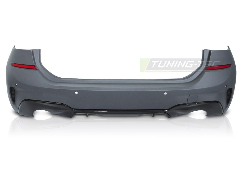 Detaljbilde av støtfanger bak til Bmw G21 Touring 19-22 med performance linjer og diffusor-detaljer.