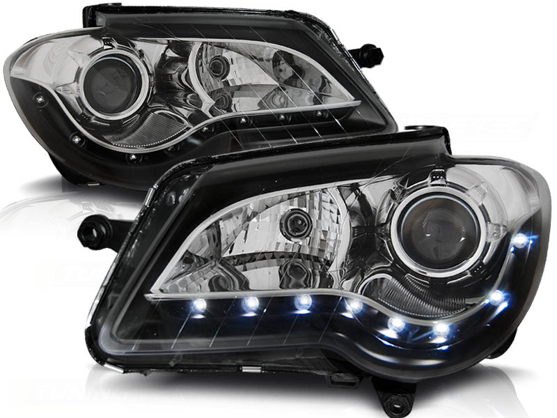 Frontlykter Daylight Black til VW Touran 06-10 sett rett forfra på hvit bakgrunn.