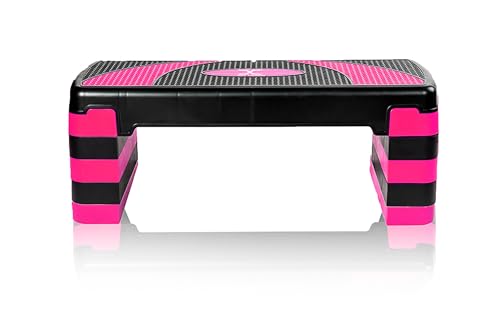 Stepper i svart plast med rosa detaljer, rektangulær form og synlige stablede høydejusteringer, sett forfra.