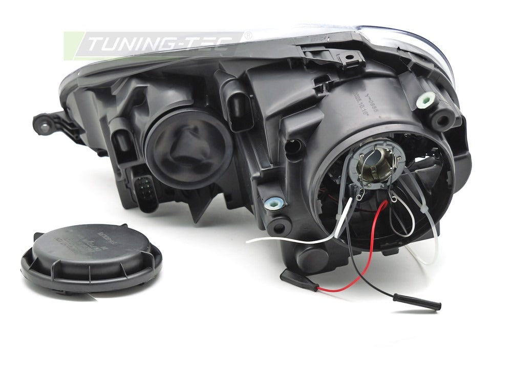 Frontlykter VW Golf V 03-09 sett fra siden — profil synlig.