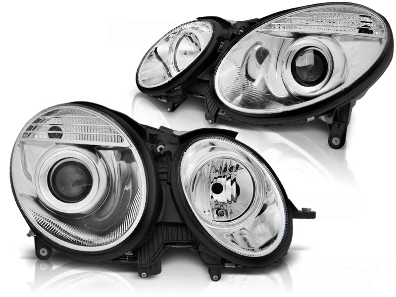 Frontlykter Chrome til Mercedes W211 05.06-09 sett rett forfra på hvit bakgrunn.