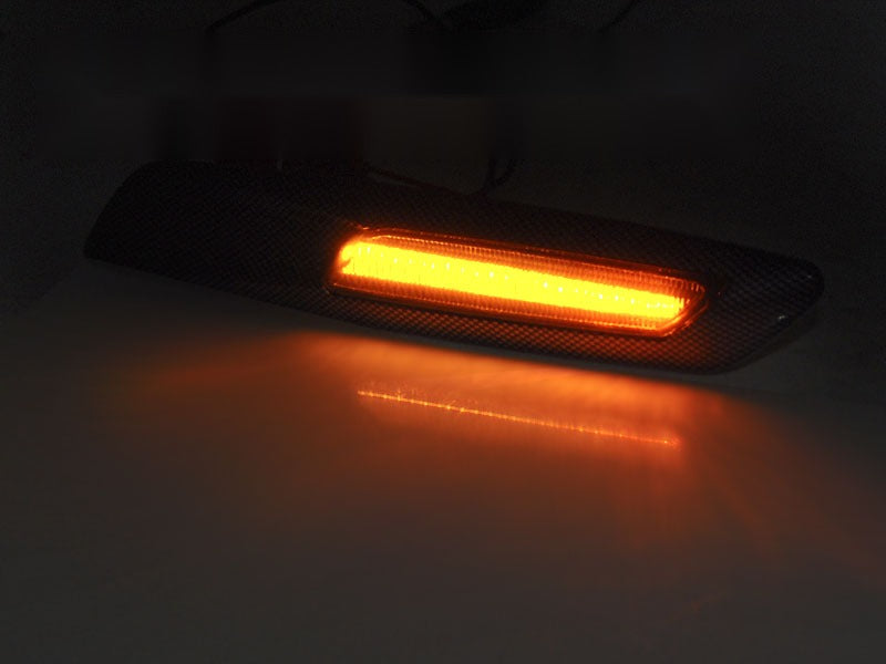 Sidemarkeringslys BMW E82 07-13 sett fra siden — profil synlig.