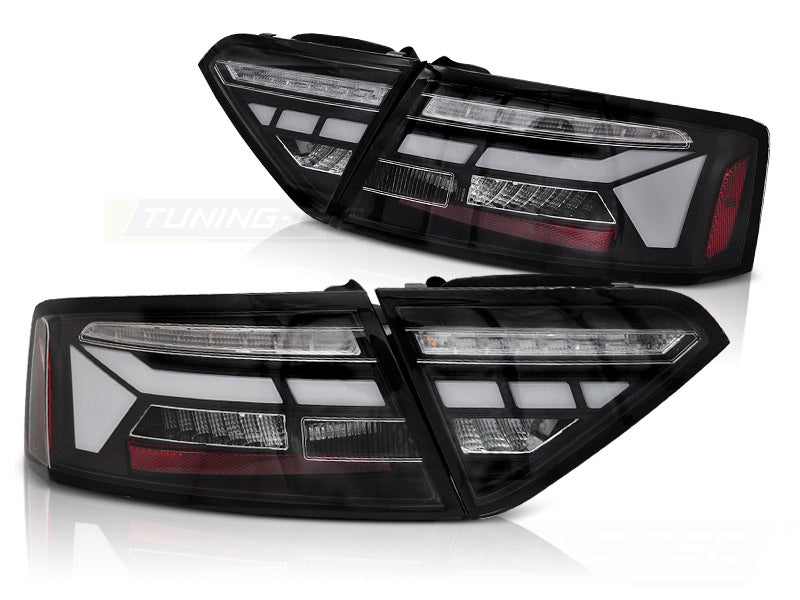 Baklykter LED Bar Black Sequential til Audi A5 11-16 OEM Bulb sett rett bakfra på hvit bakgrunn.