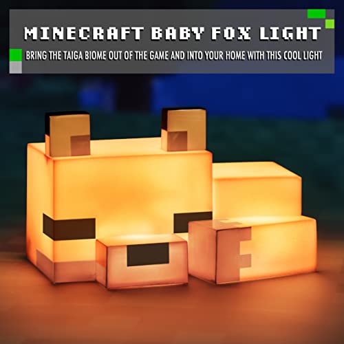 Bordlampe formet som en babyrev fra Minecraft lyser opp, kvadratisk design i oransje og hvitt, sett forfra.