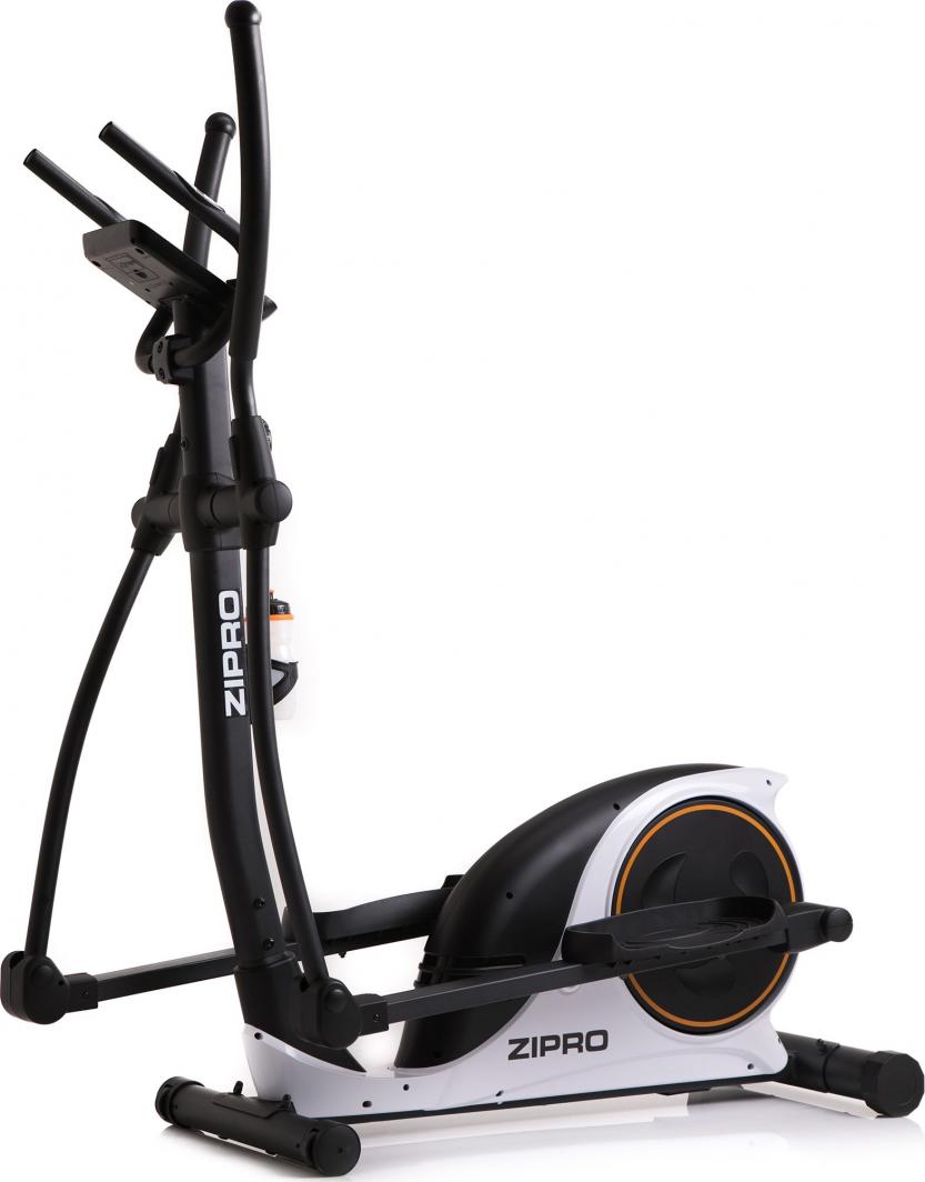 Orbitrek sort og hvit ellipsemaskin med oransje ring, store håndtak, skjermpanel og tydelig tråkkflate, sett fra siden.