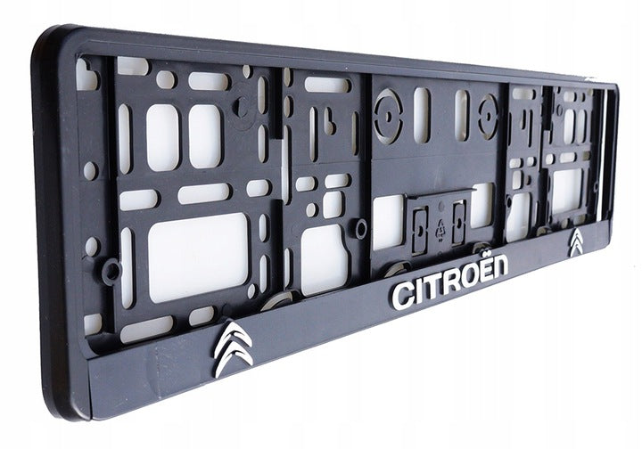 Emblem/logo til Citroen i svart og krom plast, egnet for montering foran eller bak på bilen