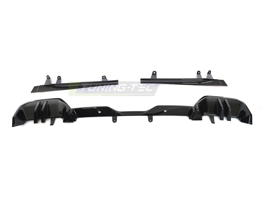 Detaljbilde av diffusor til Bmw G60/G61 23- med performance linjer og diffusor-detaljer.