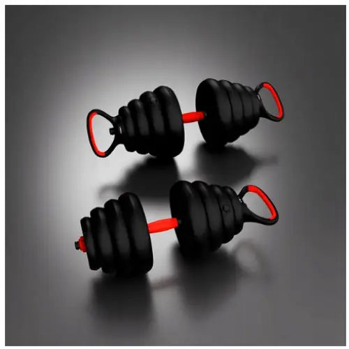 6-i-1 vektsett, to svarte manualer med røde håndtak og bølgete vektplater på reflekterende underlag.