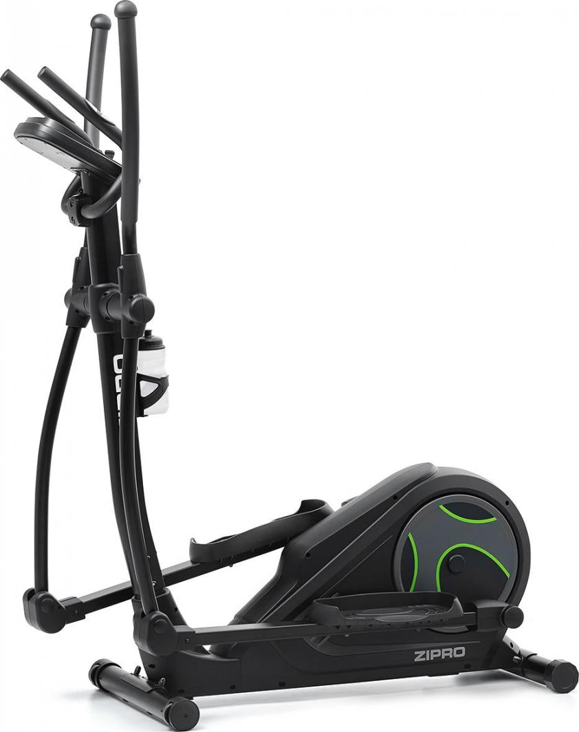 Ellipsemaskin i sort med grønne detaljer, sett fra siden, med håndtak, pedaler og drikkeflaskeholder synlig.