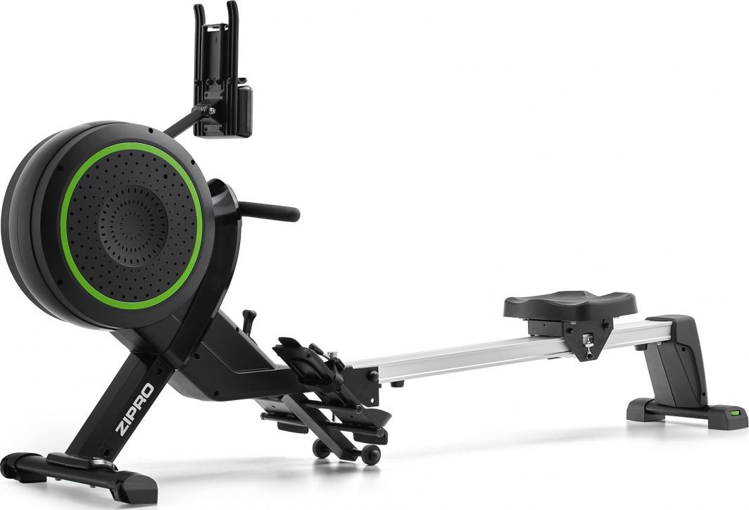 Romaskin i sort med grønne detaljer, sett fra siden med synlig sete, fotstøtter og sammenleggbar konstruksjon.