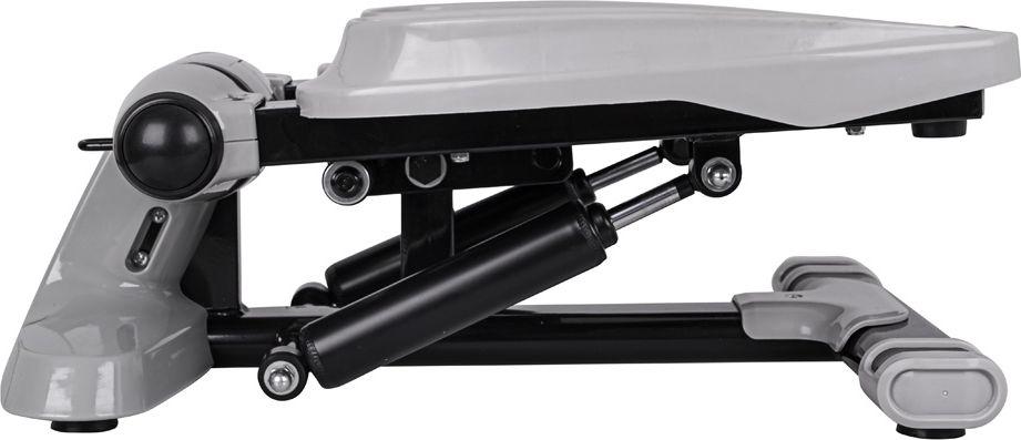 Mini Stepper med ekspandere og LCD-display, sett fra siden, viser hydrauliske sylindere og fotplater.