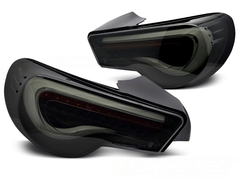 Baklykter LED Bar Black Smoke White Sequential til Toyota GT86 12-21 sett rett bakfra på hvit bakgrunn.