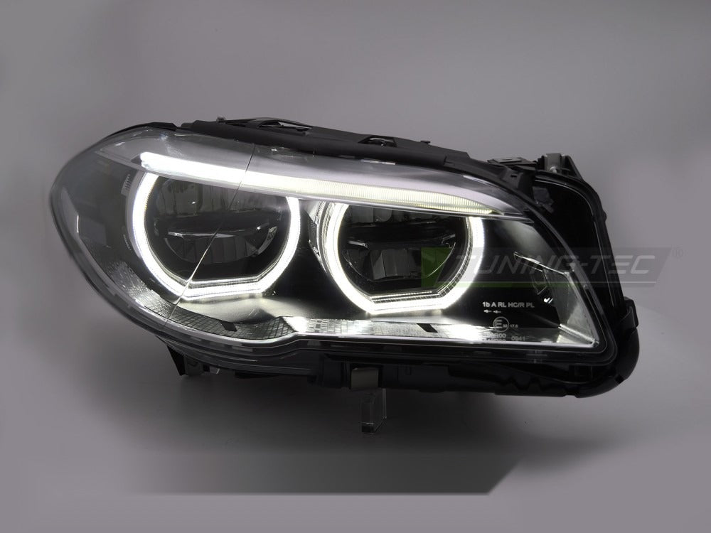 Nærbilde av linse og detaljer på frontlykt til BMW F10/F11 13-16