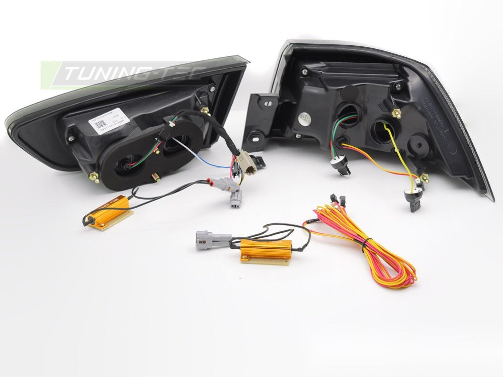Baklykter Mitsubishi Lancer 8 Sedan 08-16 med festedetaljer.