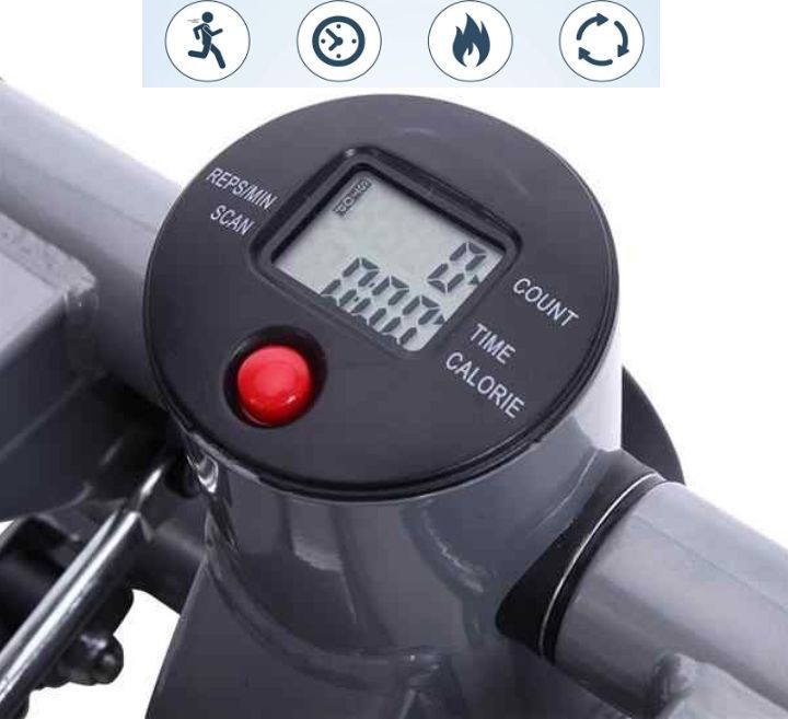 Stepmaskin med digital skjerm, rød knapp og visning av telling, tid og kalorier, sett ovenfra på grått rør.