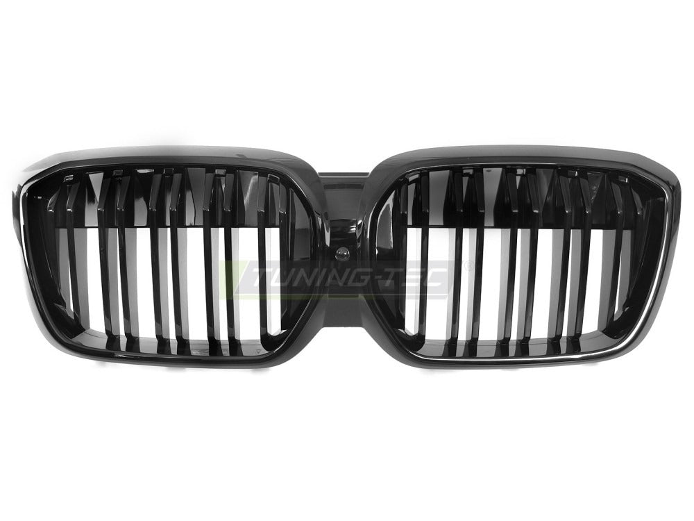 Detaljbilde av Grill iX3 G08 LCI 21-25 blank sort med lamellstruktur og BMW-nyrer.