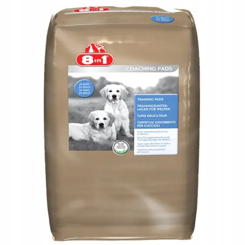 8In1 Absorberende Treningmatter 56X Store, stor beige pakke med to valper på forsiden og tydelig produktinformasjon for valpetrening.