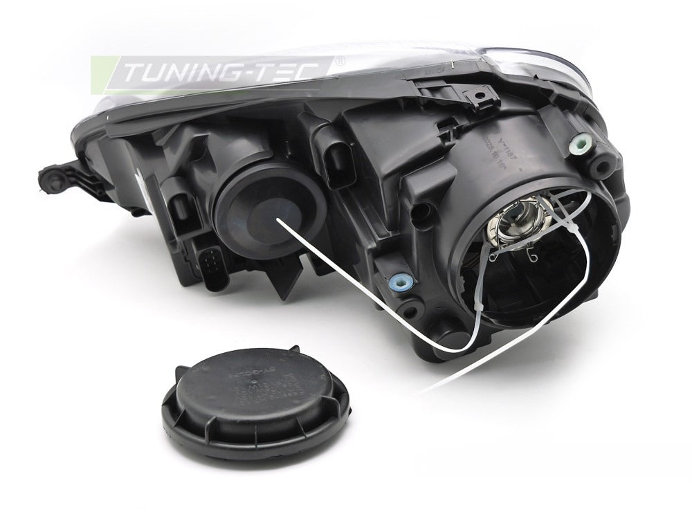 Frontlykter VW Golf V 03-09 sett fra siden — profil synlig.