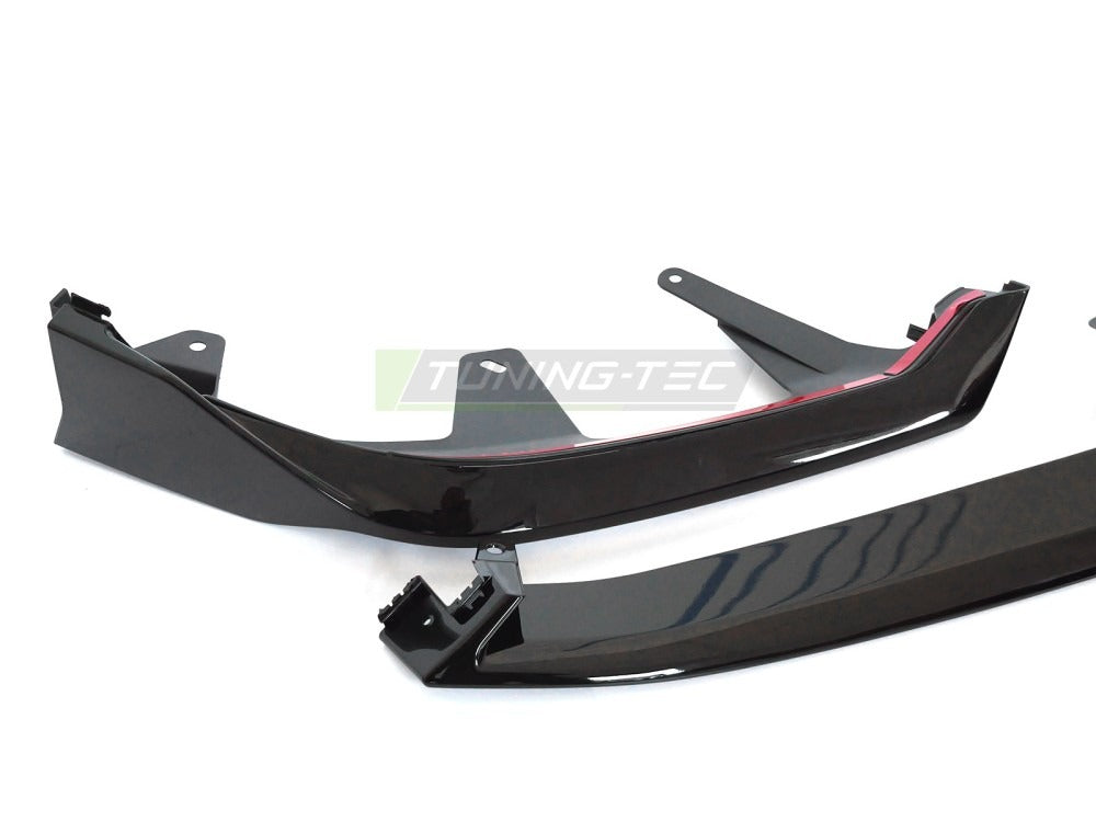 Detaljbilde av frontspoiler til Bmw G60/G61 23- med performance linjer og diffusor-detaljer.