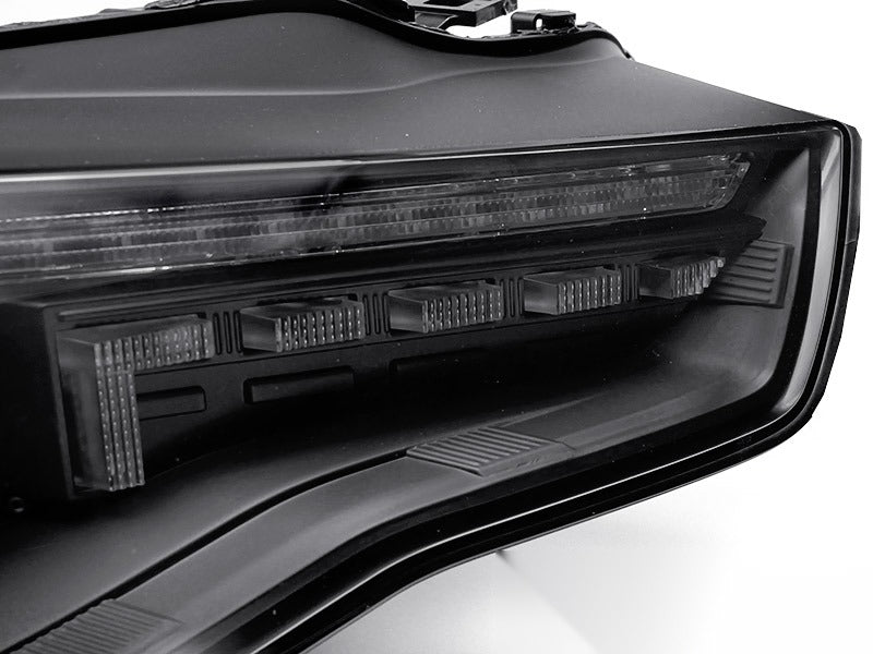 Frontlykter Audi A5 11-16 Halogen sett fra siden — profil synlig.