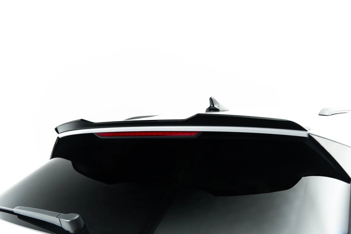 Nærbilde av blank sort ABS-overflate på Spoiler Cap for T-Roc Mk2