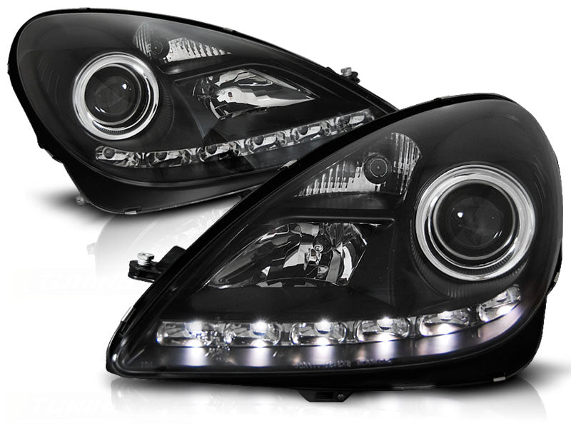 Frontlykter Mercedes SLK R171 xenon daylight svart hus sett forfra komplett par