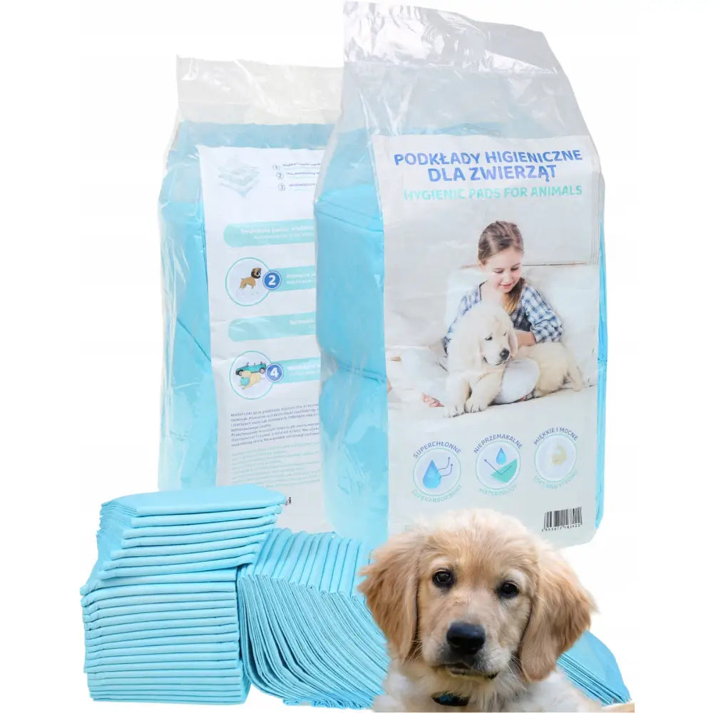 Absorberende underlag og matter Gordon Home 50 stk, valp foran stor pakke med lyseblå engangsunderlag.