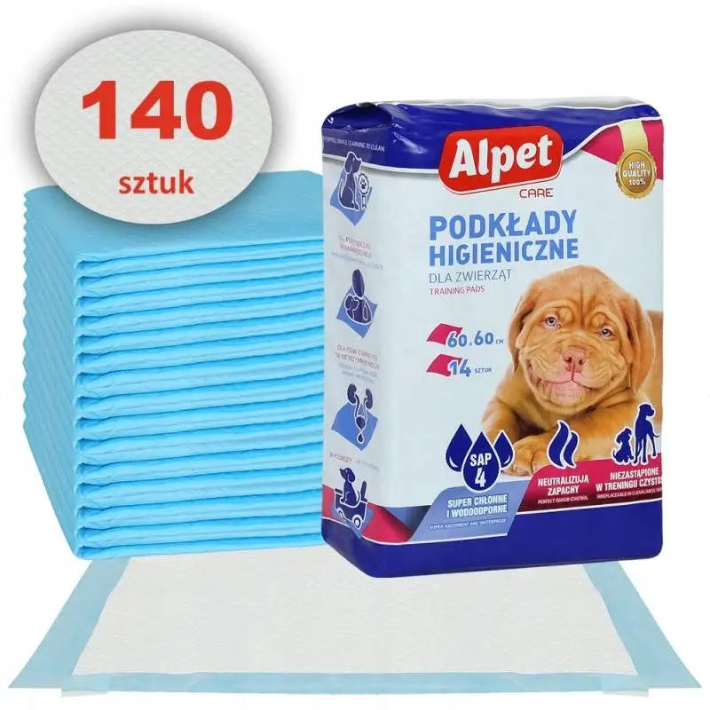 Alpet treningsunderlag for tissing 60x60cm, pakke med 140 lyseblå matter, valpebilde på emballasjen, matte spredt foran.