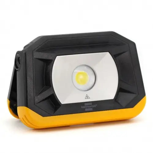 Arbeidslampe LED PF 1000 MA, skrå forsidevisning med sentrert COB-LED og gul-svart plastkonstruksjon.