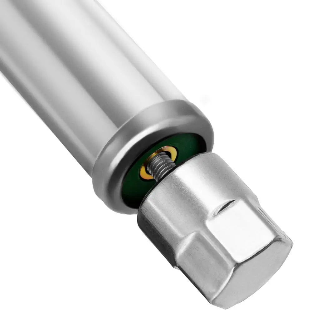 Arbeidsbenk i rustfritt stål, nærbilde av metallrør med synlig skrue, mutter og grønn innside.