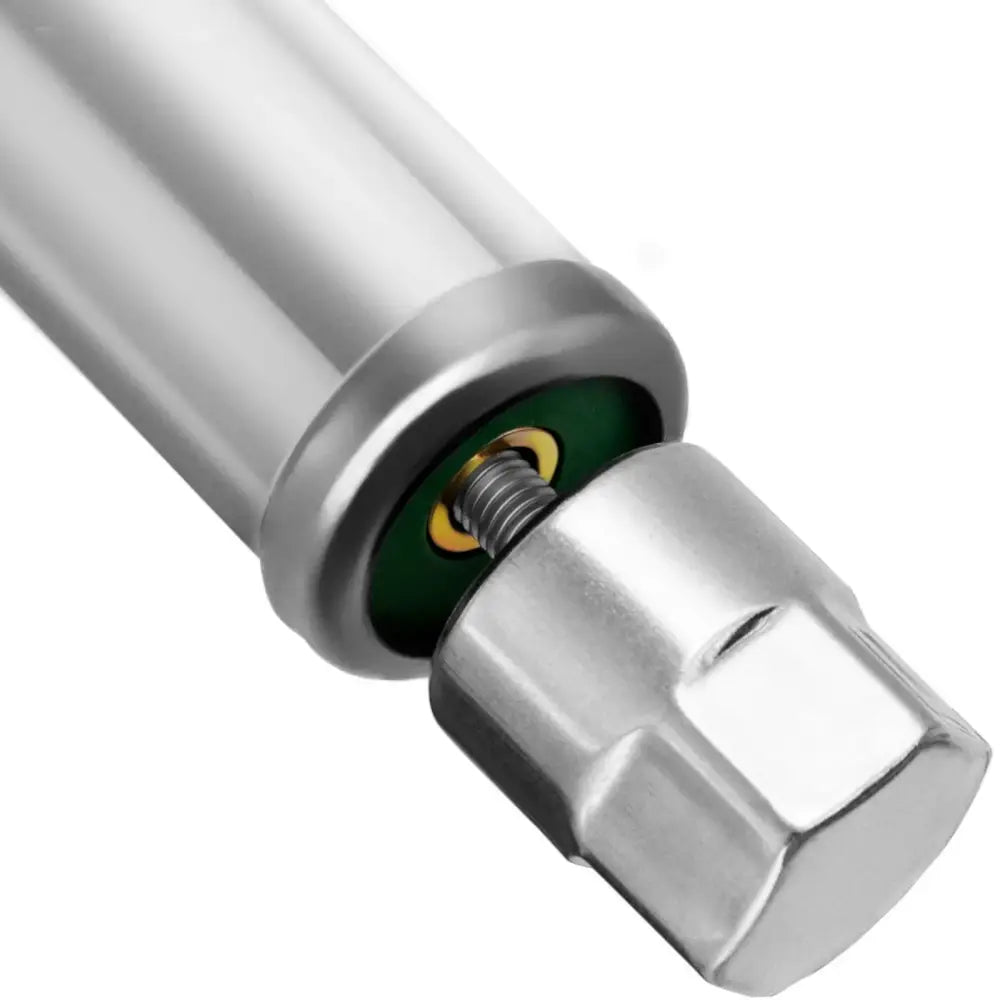 Metallisk sylinder med gjenger og sekskantet skruehode, grønne og gyldne detaljer for montering av arbeidsbenk.